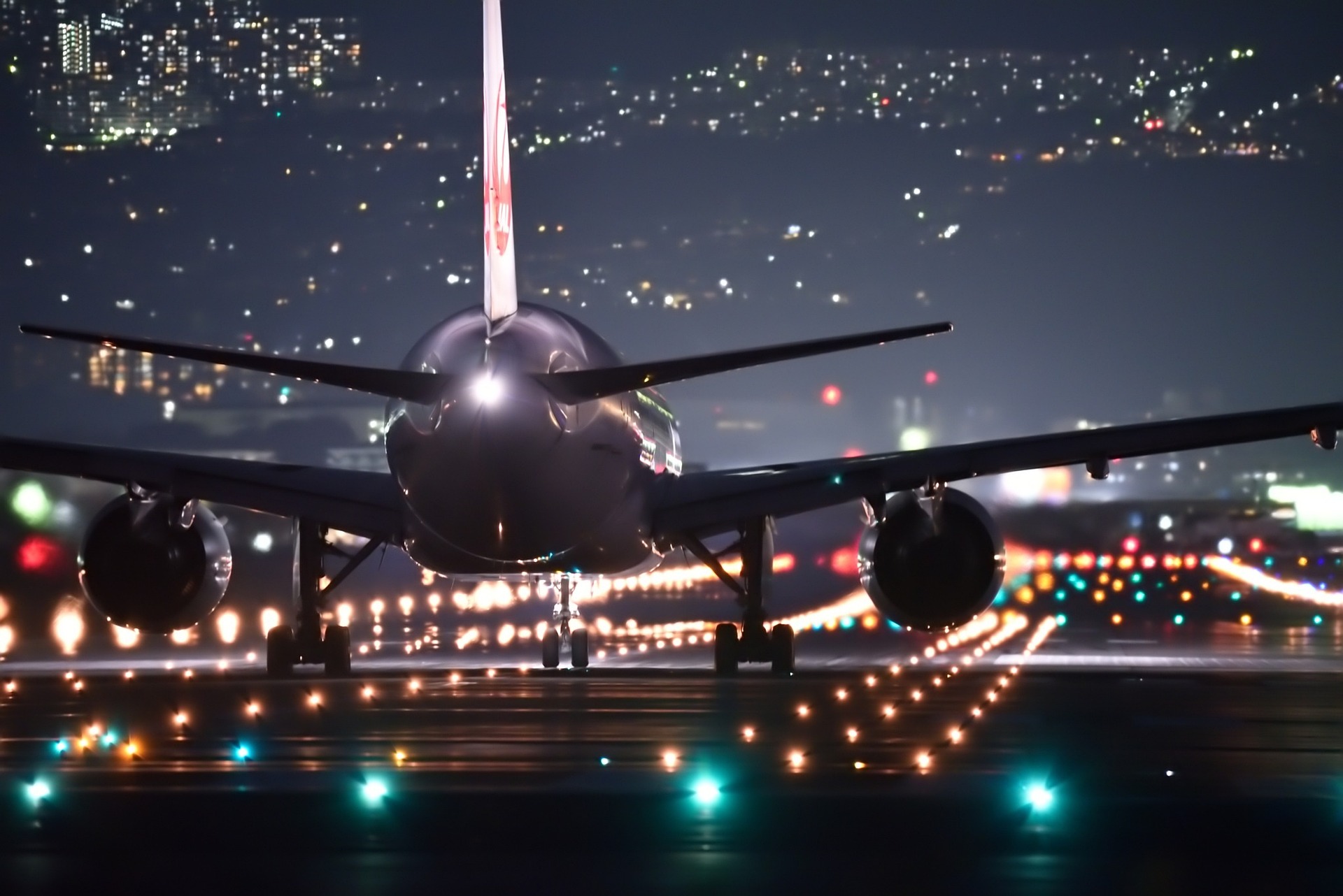 Airplane on runway at night